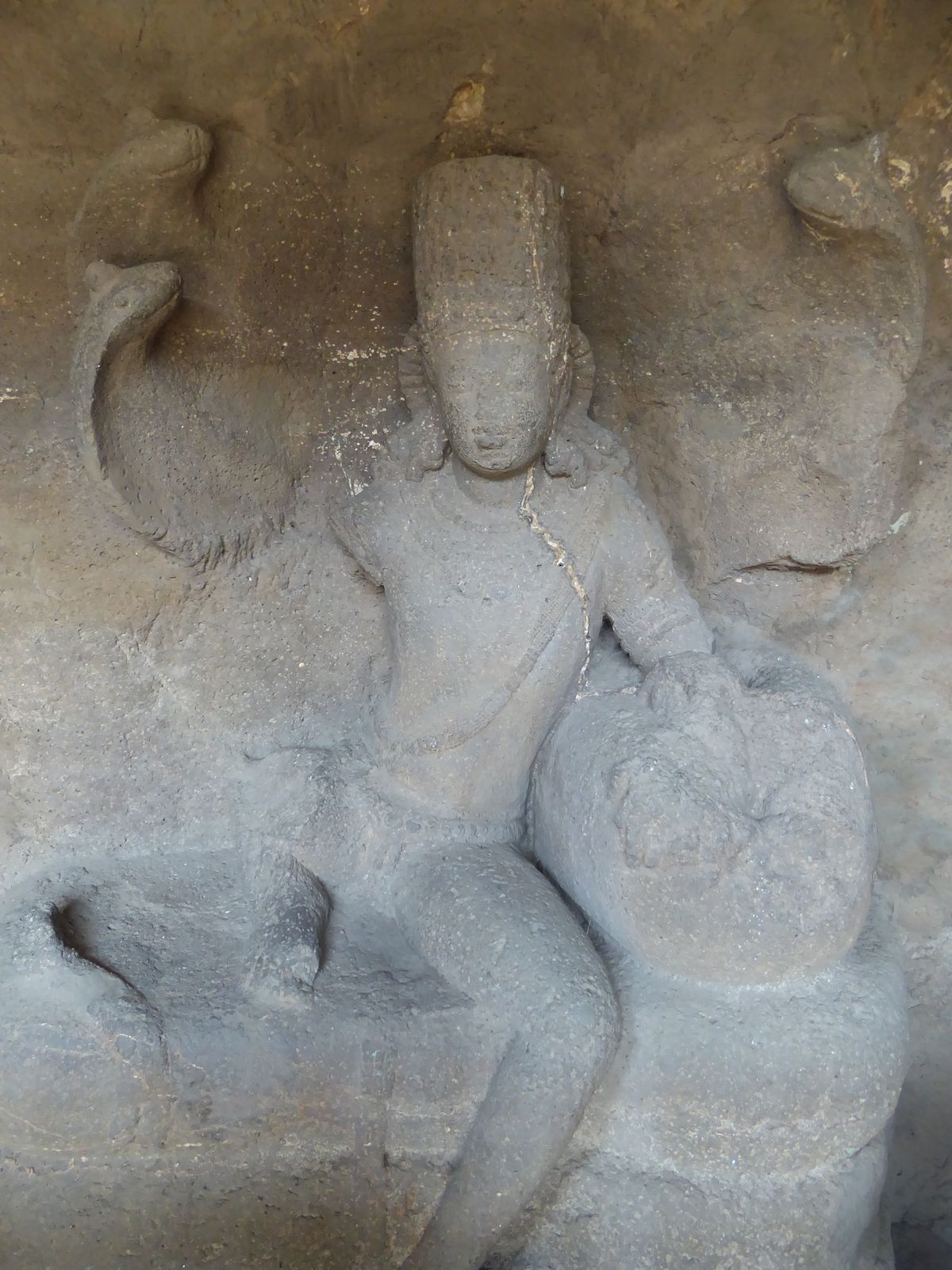 Step through the doorway between the elephants, and you bump into this life-sized image of Nagendra, the protective snake deity here functio