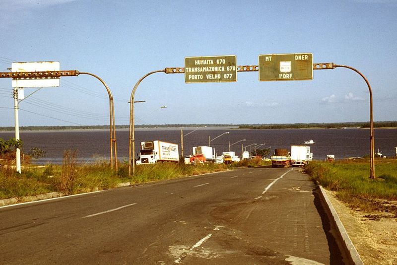 Ferry lineup to cross the Amazon, a few miles south of town. The confluence of the Amazon and Negro is marked by the line separating the dar