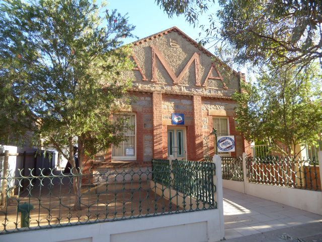 You can guess that the letters mean Amalgamated Miners Association, but you'll never guess that this was their band hall. Back then—1914—wor