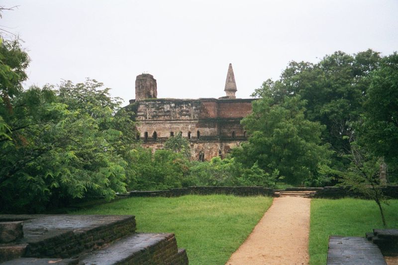 Continuing farther north: in the distance the pinnacle of another dagoba and, in front of it, the massive wall of a second image house.