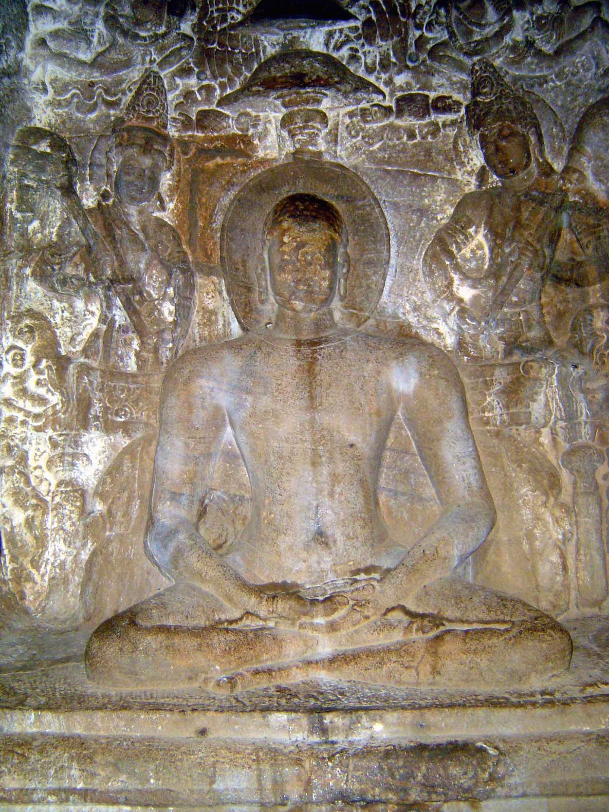 Adinath sits in repose.