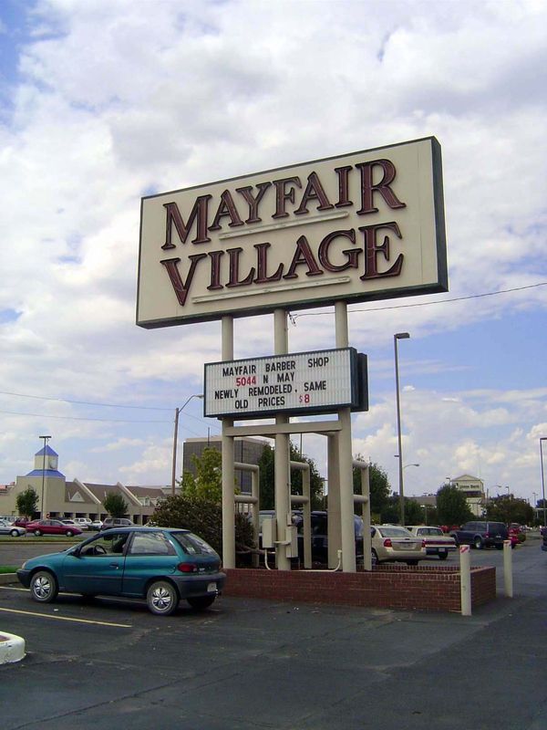 Here's a still flourishing product of the late 40s. It's the shopping-center part of Mayfair Heights, one of C.B. Warr's projects, in this c