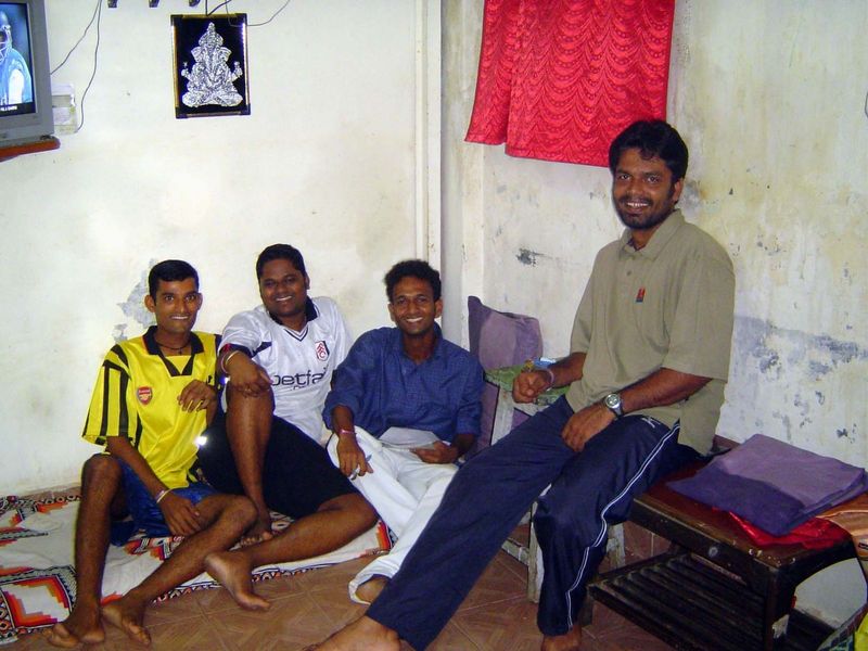 Young men watching a football match.