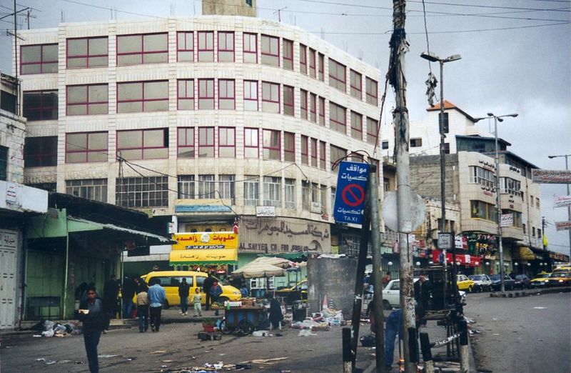 The main commercial street in Bethlehem branches off from the Hebron Road and heads east along the ridge that stretches to the Church of the