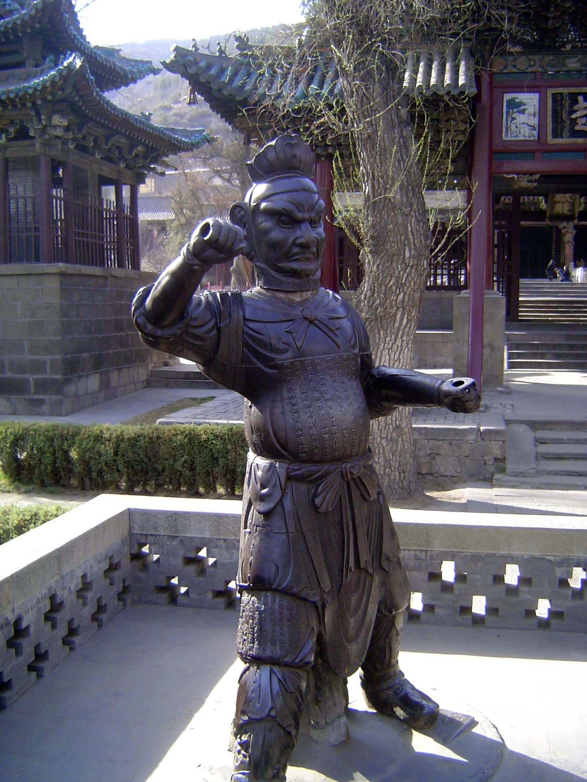 On the approach to the bridge there is a terrace with four iron statues. Only this one, from 1094-98, is original and was apparently intende