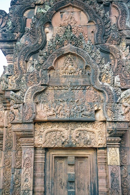 On the east side of the sanctuary are two freestanding libraries, each with elaborate pediments. In this one the east pediment of the north 