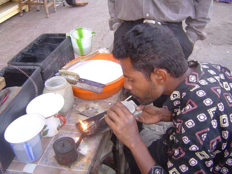 The old city has hundreds of gold and silver polishers who dip jewelry in a water-cyanide mixture, then in ammonium chloride navsagar, then 