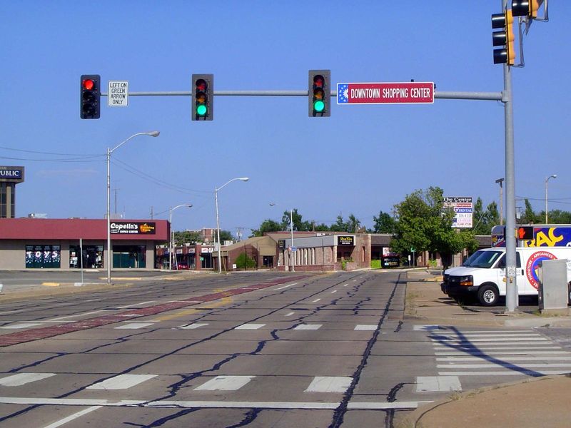 Main Street makes a 45-degree bend as it corrects from the original townsite grid in the background to an east-west alignment. The town's fi