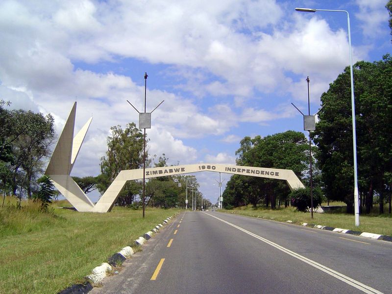 Three years after independence, this Freedom Arch was plunked over the airport road. Its girth hints at plans for a wider road yet to be nee