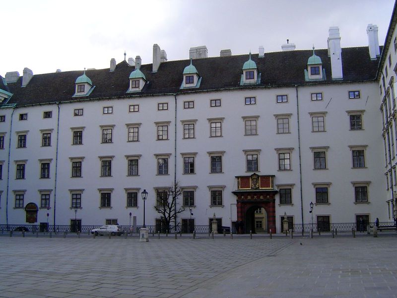 Panning slightly to the right to the oldest building of the lot, the Schweizerhof, remodeled in 1550. The building is much older than the na