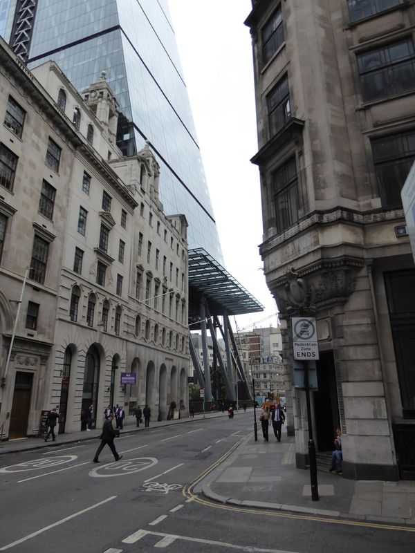 No, the building on the left isn't drunk; it just looks that way because of the Cheesegrater, whose site was previously used for over a cent