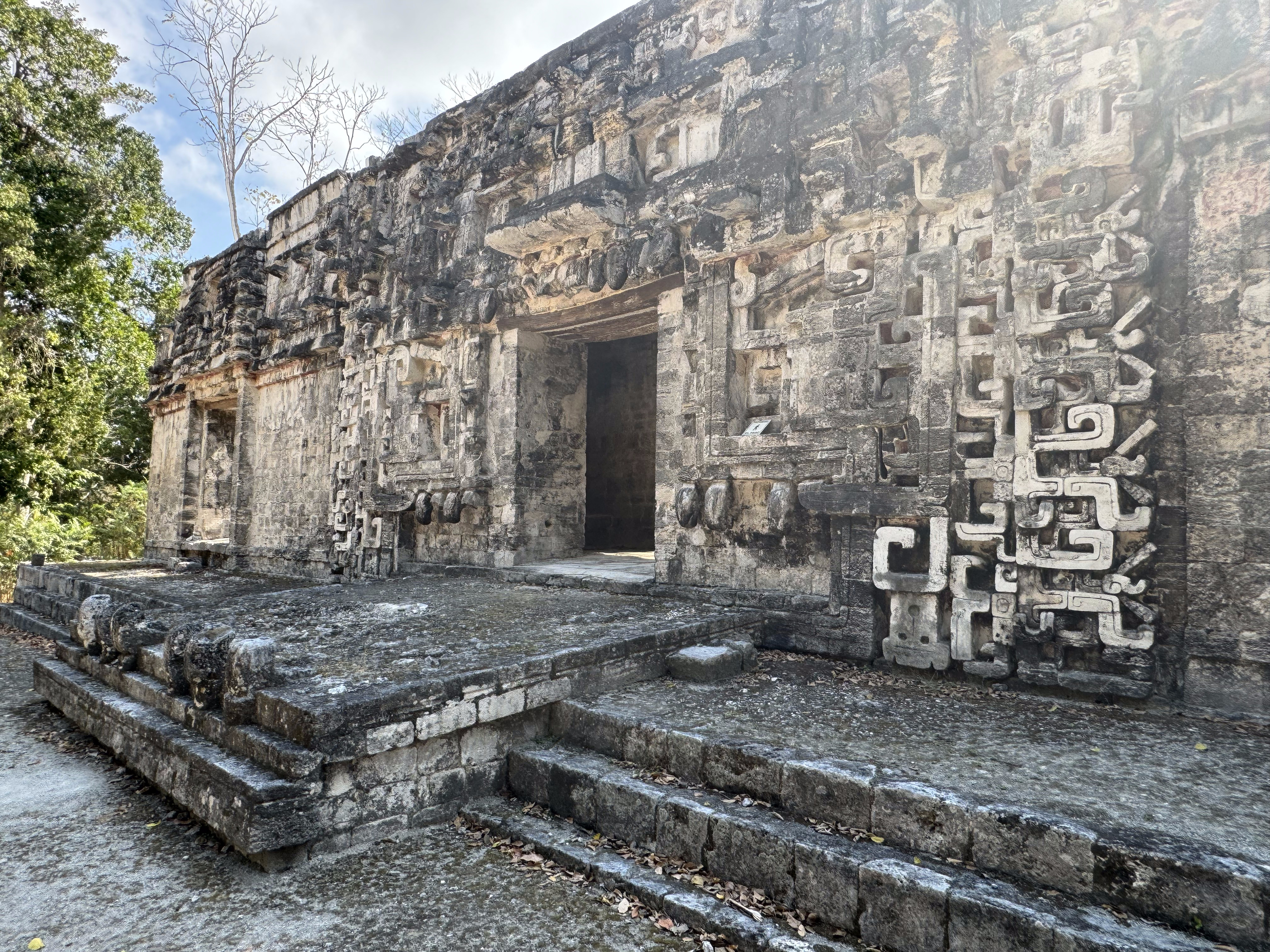 Oh, for a better photographer.  This is Chicanna's Structure 2, with teeth above the door and lower teeth at the edge of the porch.   The te