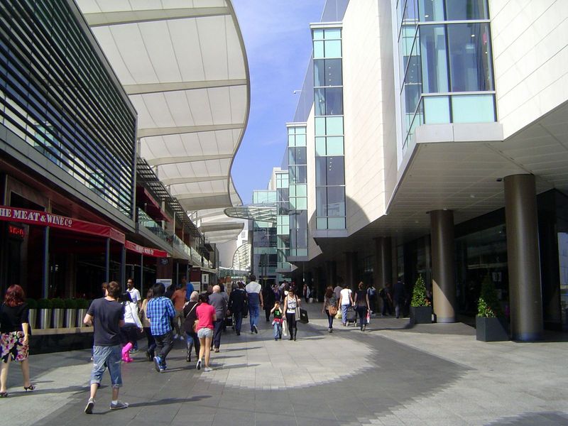 We're on our way to the indoor section. An unhappy Jonathan Glancey, writing in the Guardian when the mall opened, called it "a cross betwee