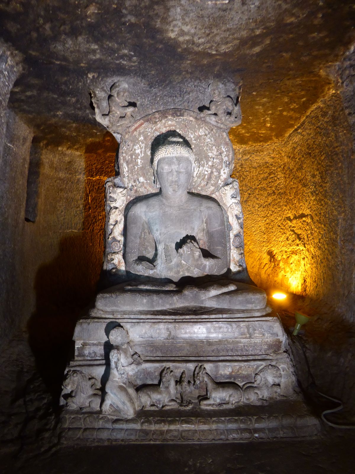 It also has a worshipper praying at the Buddha's feet.
