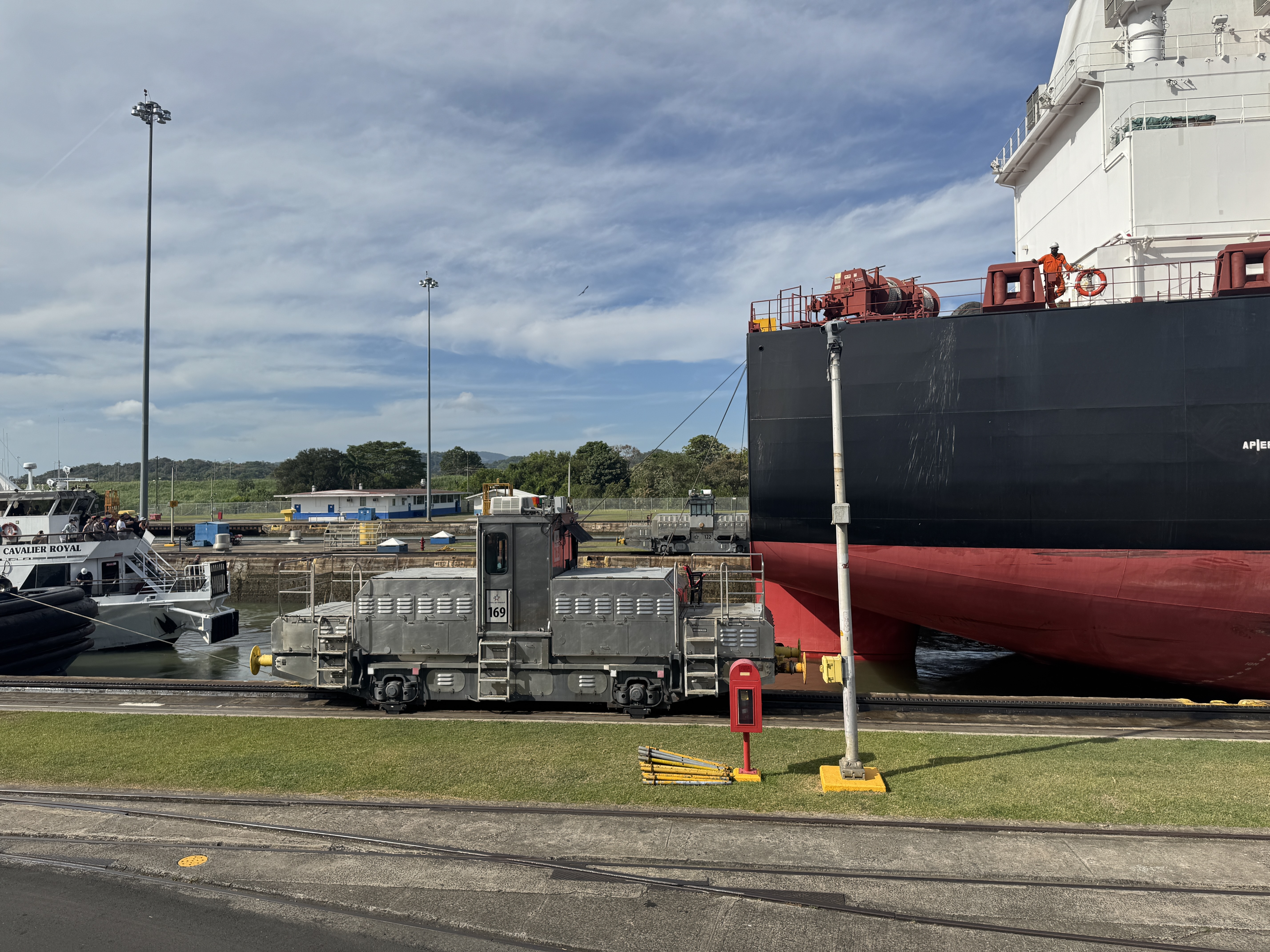 When the ship's ready to move, the lock gates in front of the ship open, and donkey engines start moving at the speed of a crawling baby.   