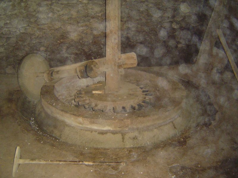 Here it is, with a wheel that runs in a stone trough. It's broken at the moment and missing critical parts.