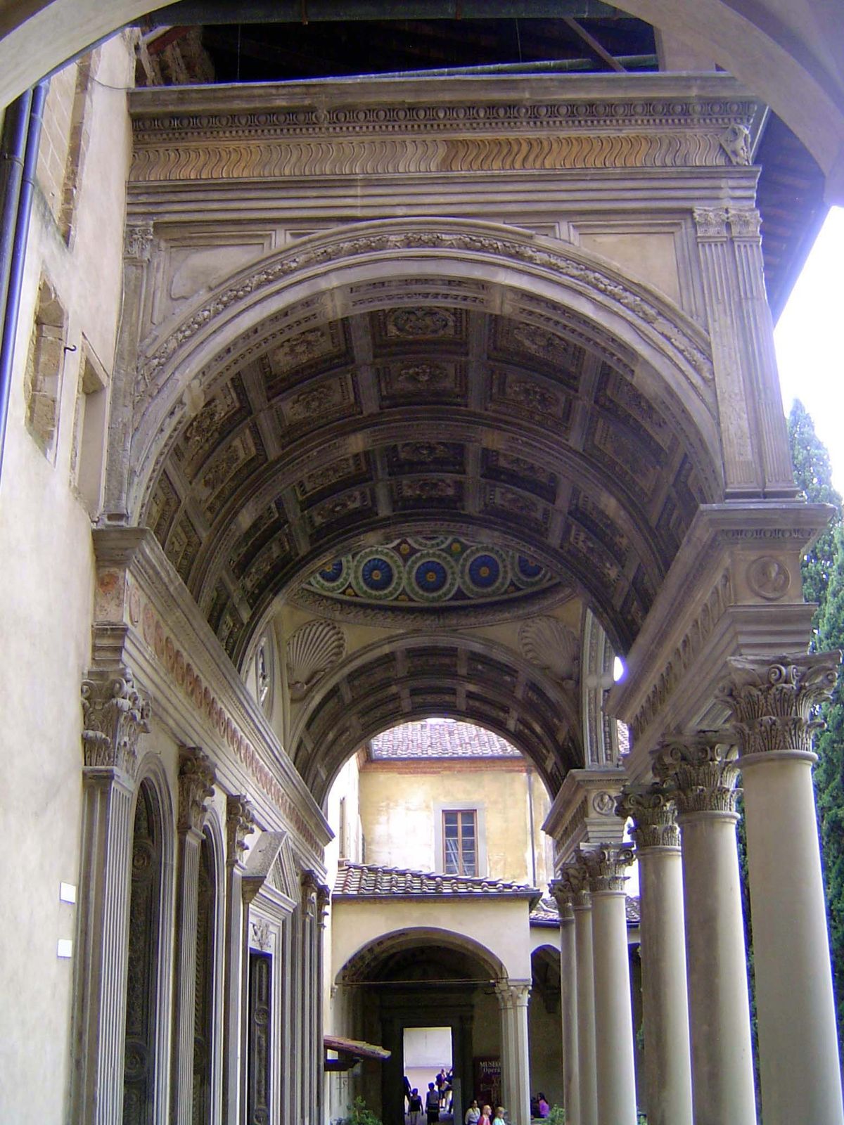 Stepping outside to the cloister and the Pozzi Chapel.