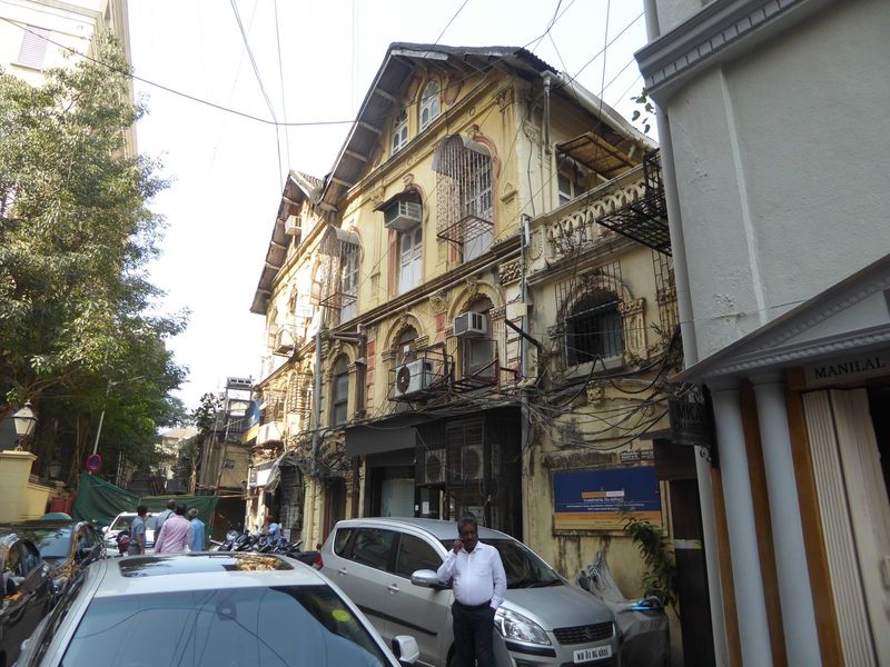 Here's the same building, which is classified as a heritage structure. Bad enough for bicycles; how cars get in and out is a mystery.