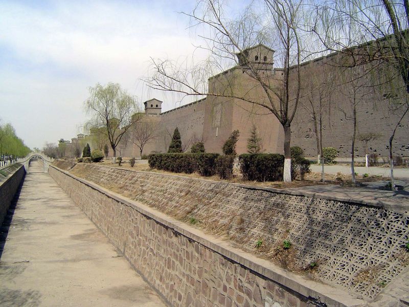 Pingyao has been a UNESCO World Heritage site since 1997, but its luck began 20 years earlier, when the city wall protected the urban core f