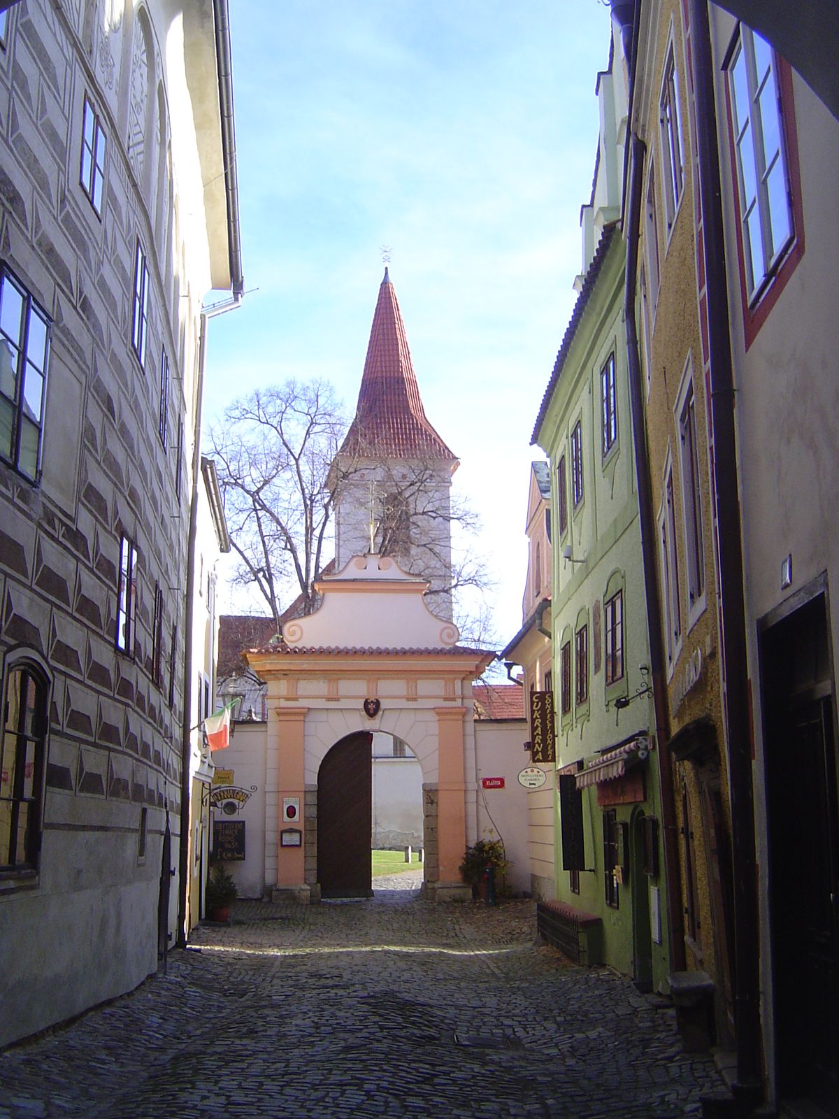The gate here is gone, but just as a hint of what it looked like, here's the town's one surviving gate, the I Budejovica Gate, in Latran.