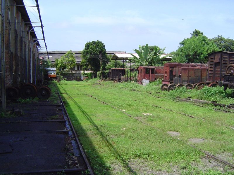 Semi-abandoned workshops. The tracks are for a rolling platform that can move cars from any track on the right side of the picture to any tr