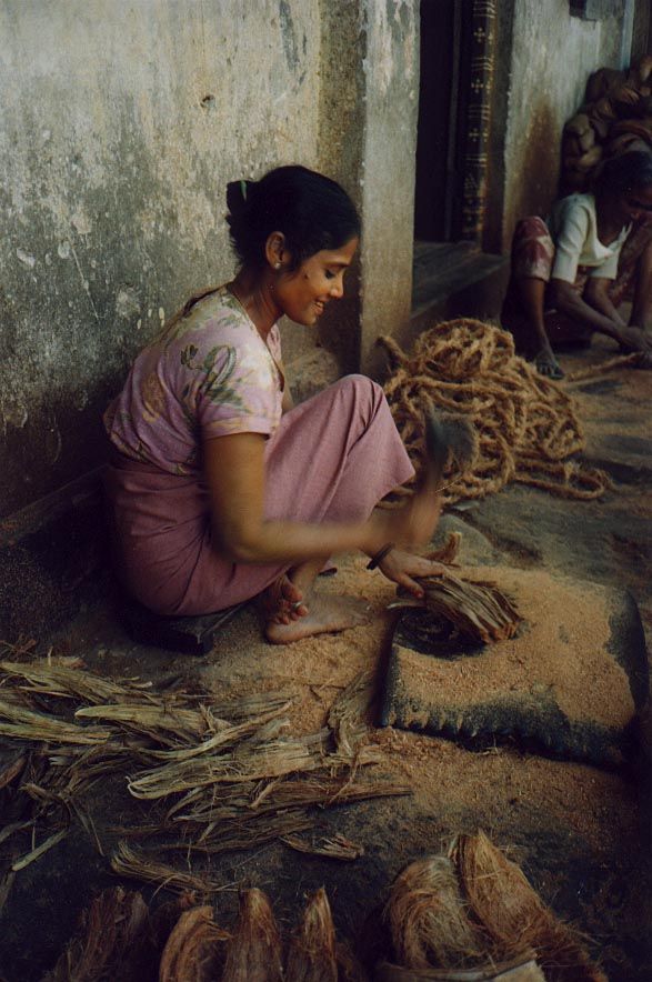 It's an assembly line, with the extracted coconut-fiber woven into coarse rope.