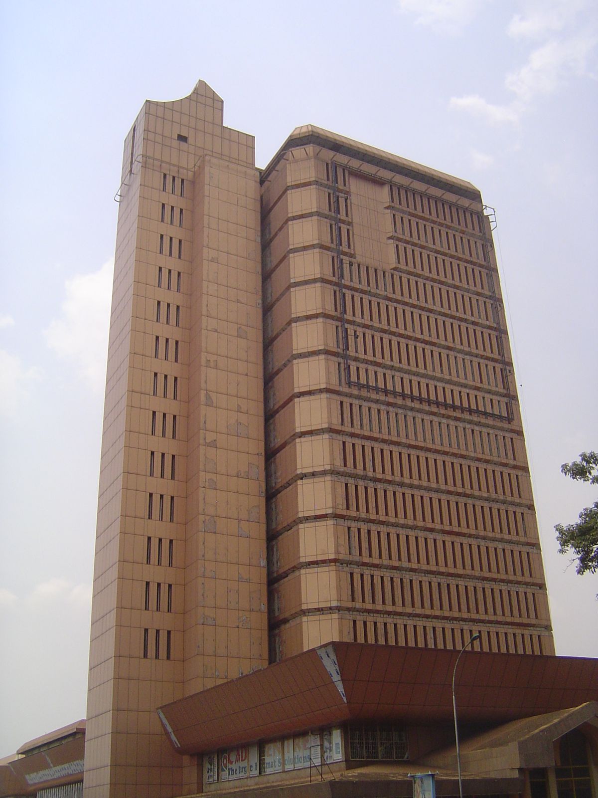 The Cham Towers were built as the Uganda Commercial Bank, which was eventually sold to the Standard Bank of South Africa, which in turn sold
