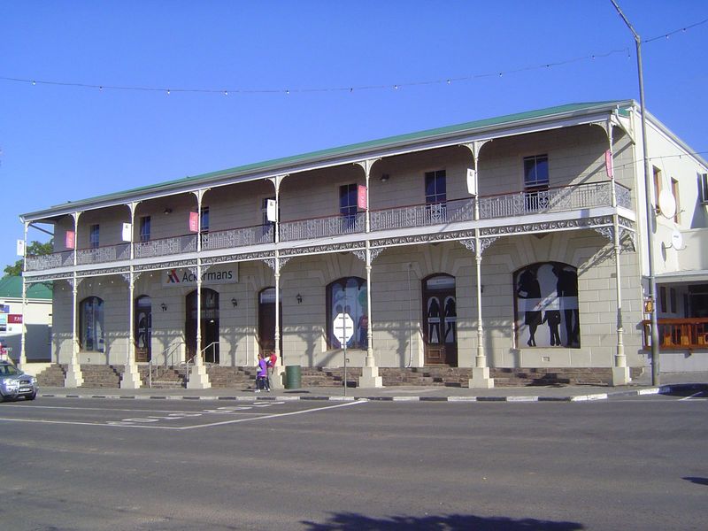 This building went up in the 1880s. Now it's a dry-goods chain store, but it was the Royal Hotel in 1930 and later became the Hotel Ten Damm