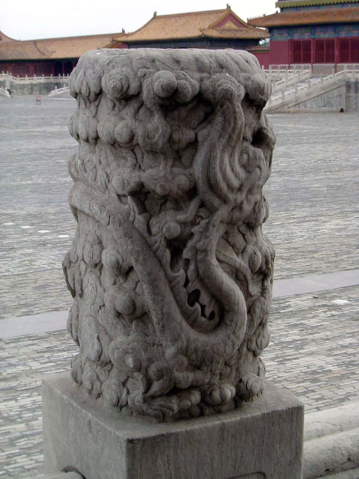The balustrade posts are decorated with symbols of the emperor and empress. Here, the masculine dragon.