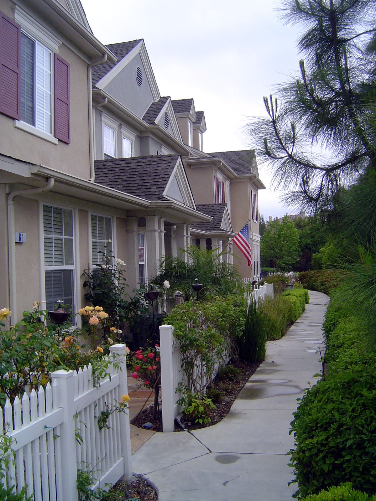 The stairs lead to sidewalks so narrow that they seem almost designed to make walking a solitary experience.