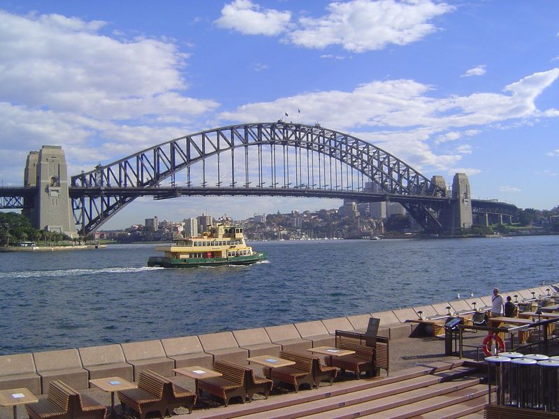The opera house overshadows everything in sight, even perhaps the once-iconic Harbor Bridge, completed in 1932.