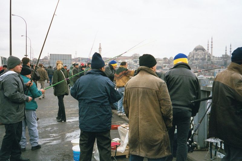 Enough of grandeur; let's go fishing. Here, the Galata Bridge, across the Golden Horn. This picture was taken from the north side, looking b