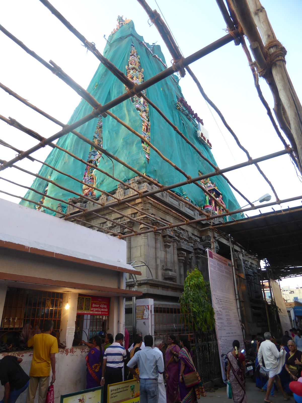 It's a busy place with perennial renovation works, in this case wrapping the gopura at the main entrance.