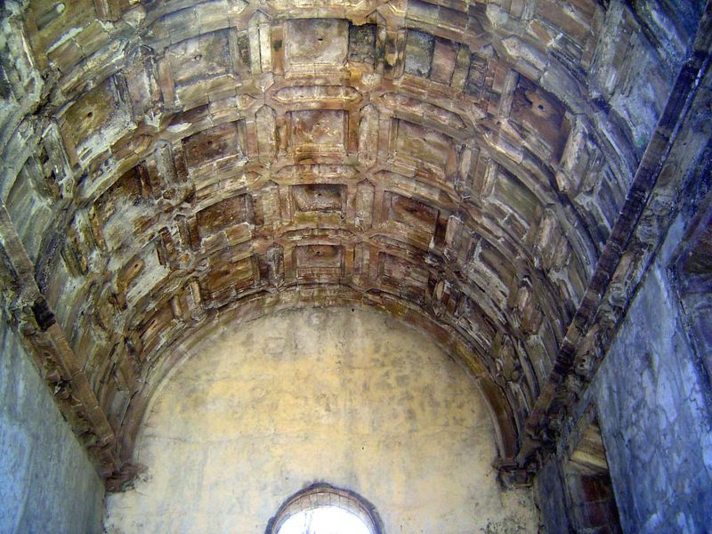 A coffered vault over the altar.
