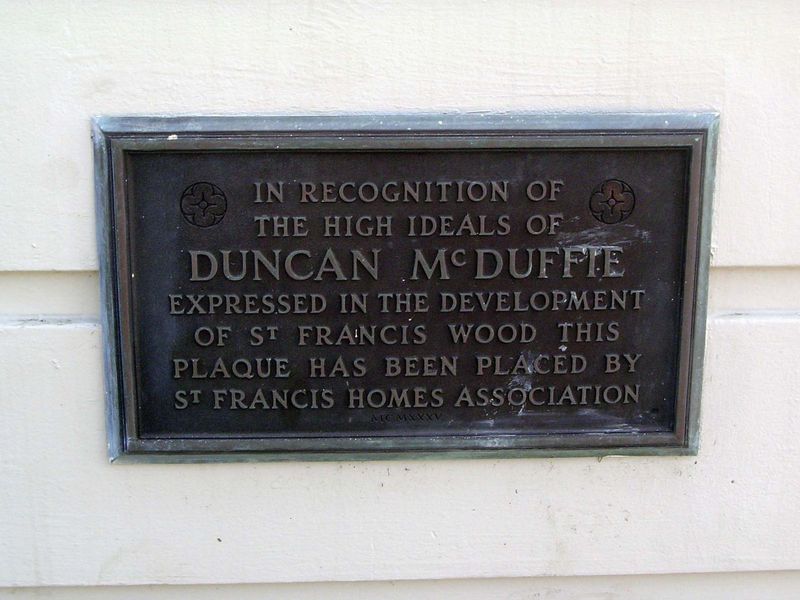 An undated plaque recalls the neighborhood's chief founder, whose name also lingers in the name of the realty company called Mason-McDuffie.