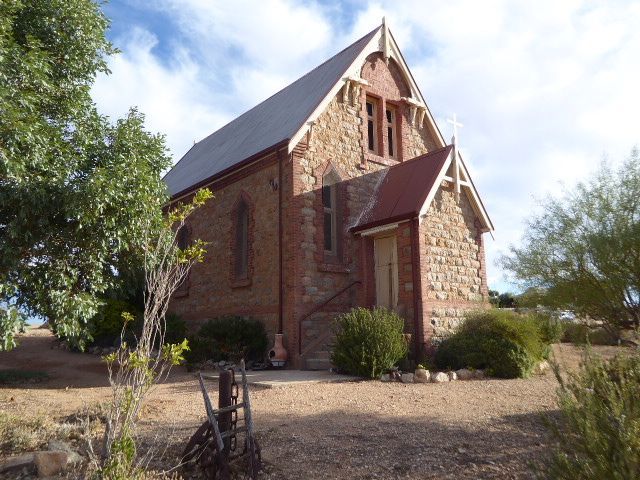 The ore gave out in 1889, but a few buildings are still in good shape. Here's one, the St. Carthage Catholic Church, saved not by the faith 