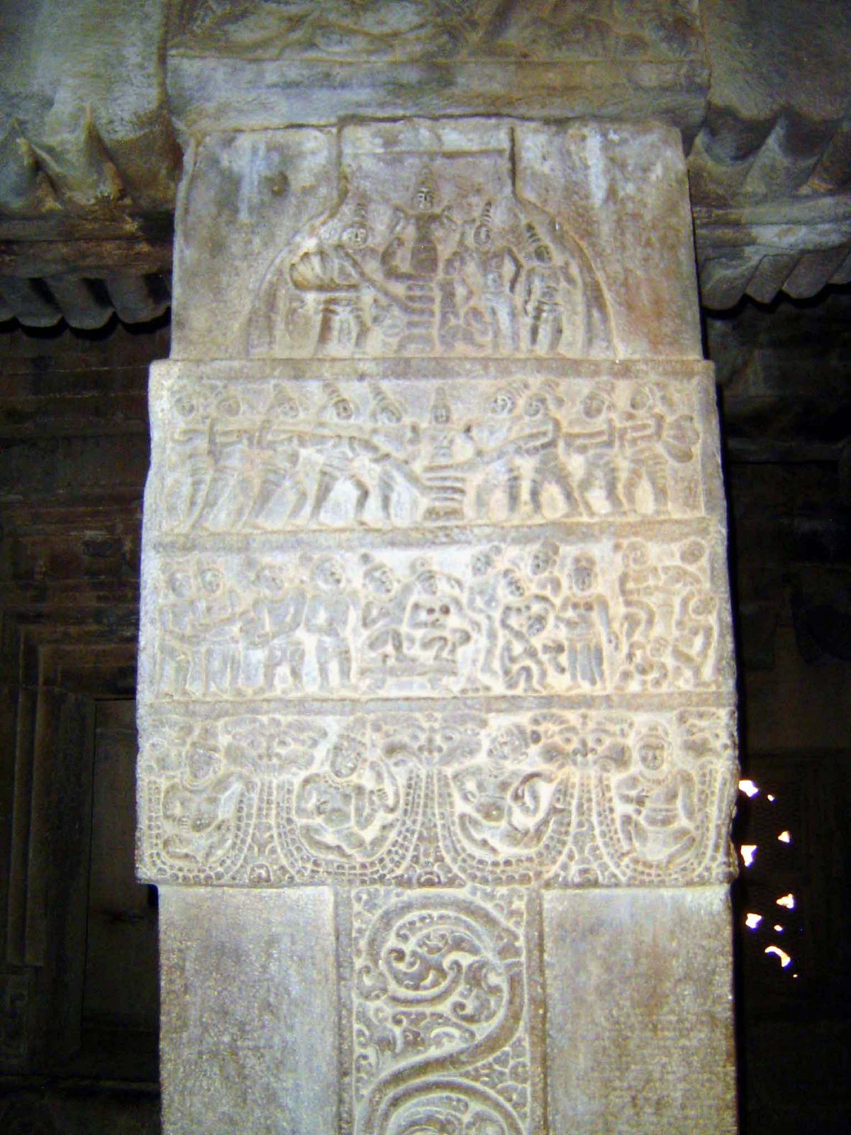 Here, the churning of the milky ocean as gods and giants pull opposite ends of the serpent Vasuki, his body coiled around the churn of Mt. M
