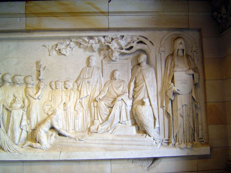 Also surviving in the entrance hall is this relief of Kaiser Wilhelm receiving homage. He sits beneath an oak tree. Wilhelm II, then a princ