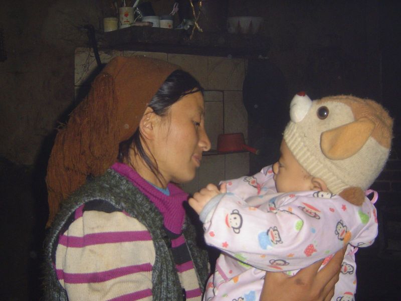 Mom has four kids. Not exactly the demographics that outsiders expect in China.
