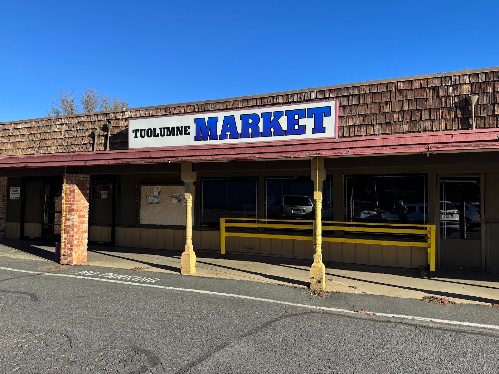 Even the supermarket is gone, except for the sign.