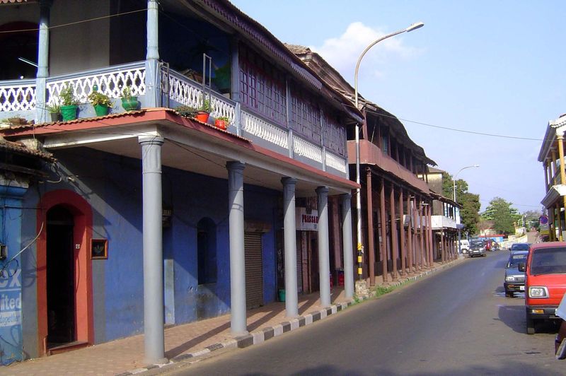 A late vintage is suggested by the use of iron columns. White paint is reserved for churches.