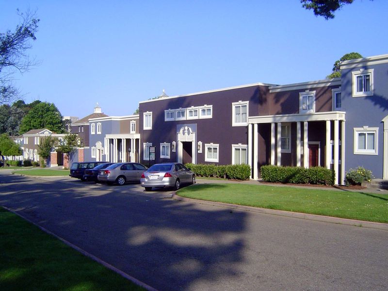 So here was a not-quite-utopian neighborhood. Heavily landscaped row housing, minimal street parking, no private garages, and each block bui