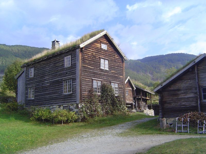 It's the Haugen farmstead, moved here from Luster, site of the stone church seen previously. It's late, dating from the early 19th century, 