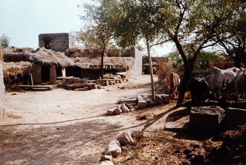 Making a circuit through the village in mid-afternoon. People are indoors, and the place is silent except for the occasional voice.