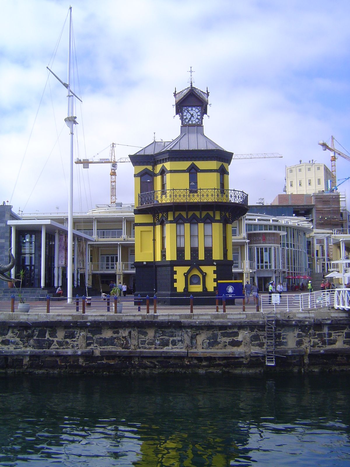 The clock tower at the opening to the Alfred Dock opened in 1883 and originally housed the harbor office.