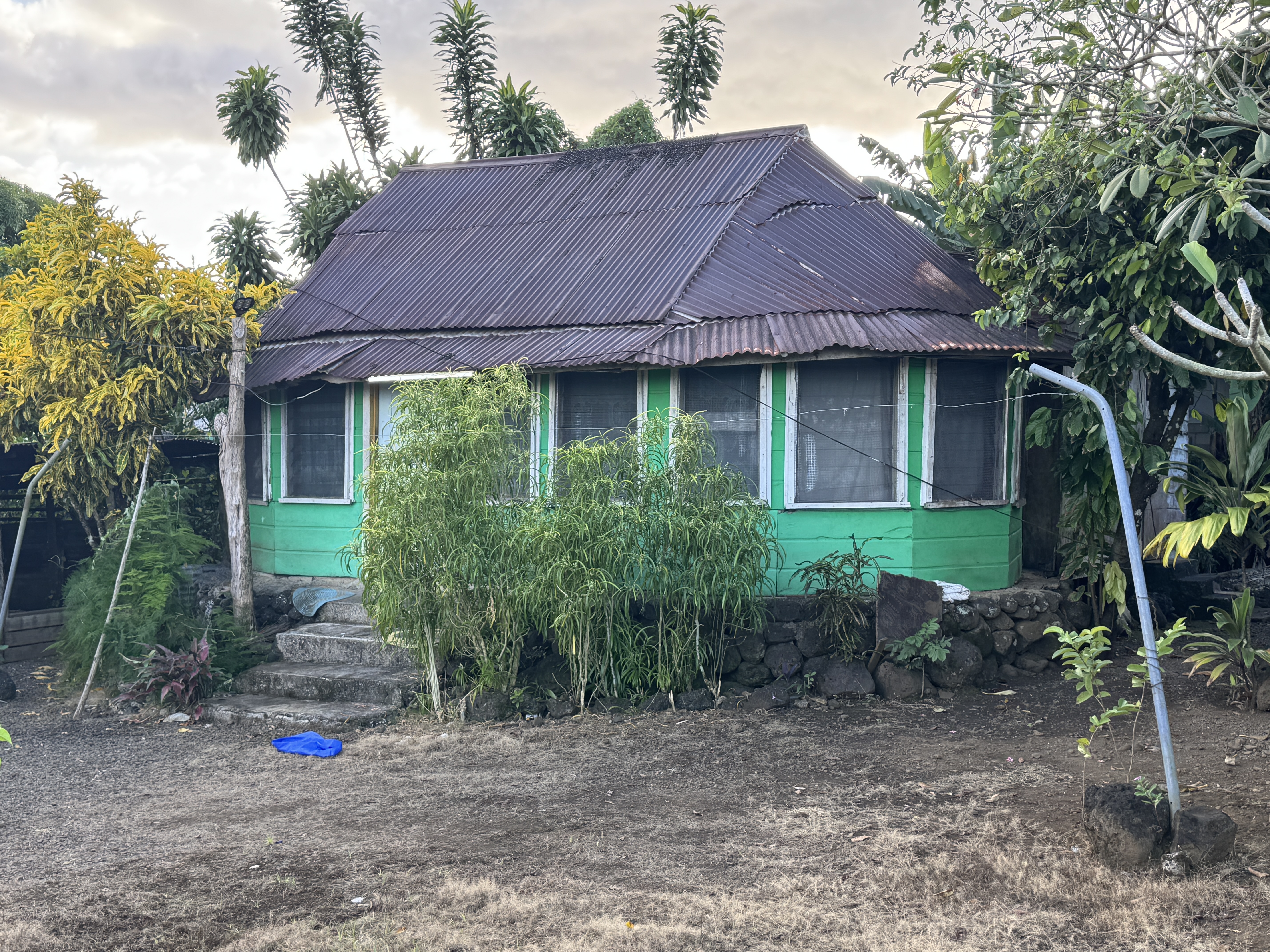 Here's a modern house with walls, a door, and windows, yet echoing the old shape.