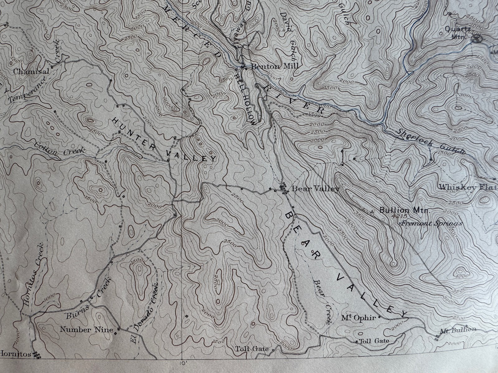 The road and the name Hell Hollow appear on this 1897 USGS Sonora quad.   Apple Maps retains the name Hell Hollow; Google Maps does not.  Sc