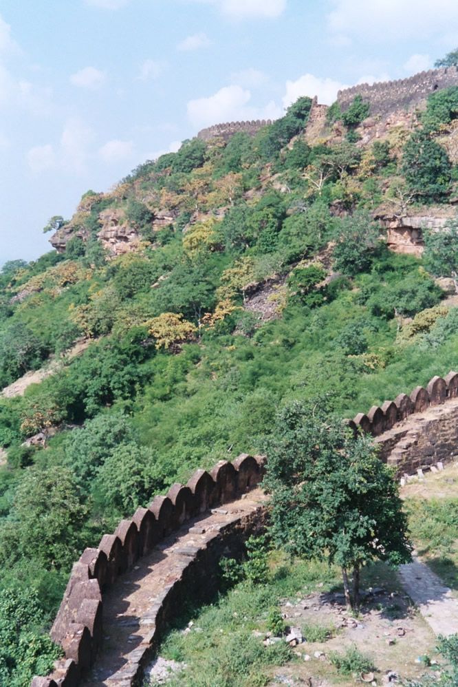 A wall encircles the summit.