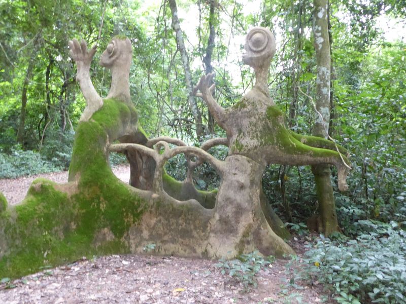 A tunnel-like gate, this is the entrance to the Igbo Ifa, a space devoted to diviners and herbalists babalawos.