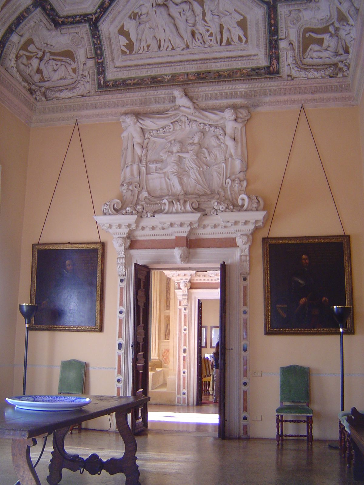 View through to the next corner room, with sunshine pouring in from the door to the southeast portico.